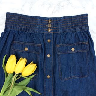  When it's officially spring but you've skipped the gym all week -- elastic waistbands are the way to go  Shop this denim knee-length skirt for less than $25 with @liketoknow.it www.liketk.it/2gd1W #liketkit 