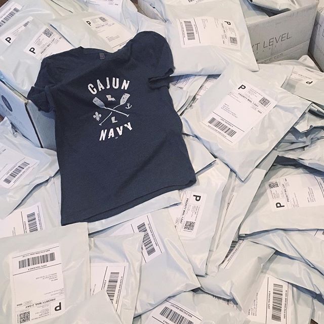 SFT Cajun Navy T-shirt Raises $40k for Greater Baton Rouge Food Bank | Shop It in Purple & Gold, Black & Gold and Blue